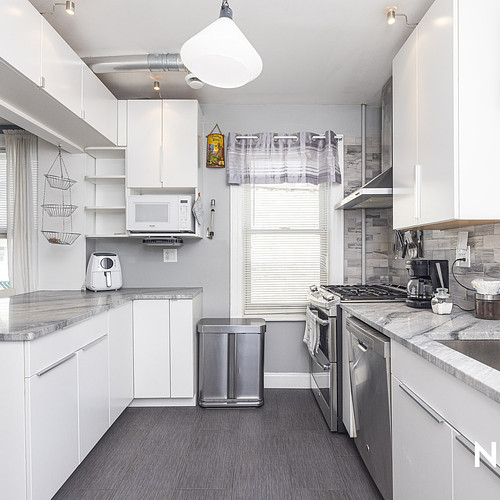 61-11 64th St